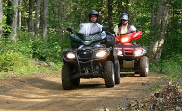 ATVs on a trail